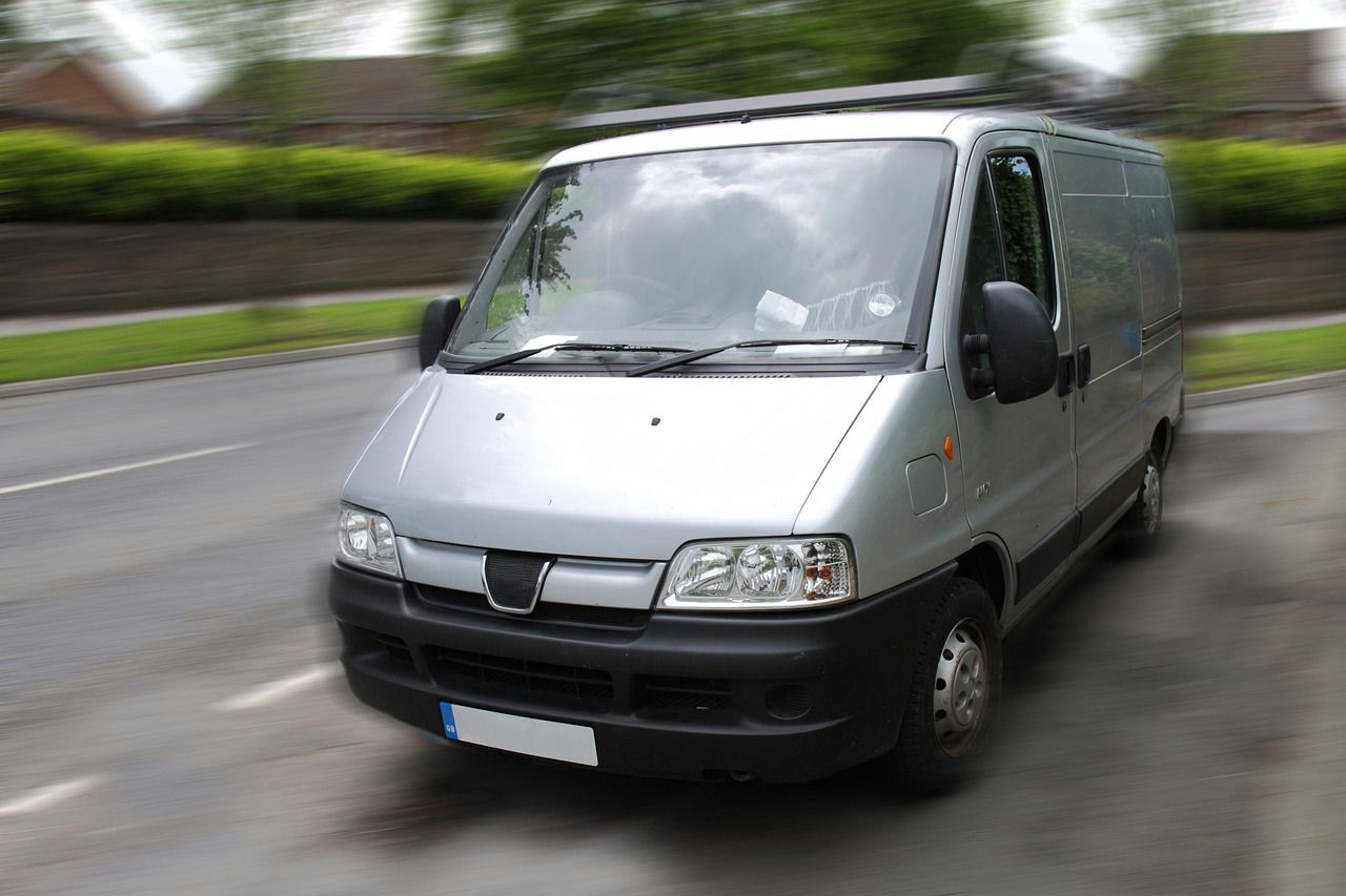 Unbranded courier van on its way to a business delivery